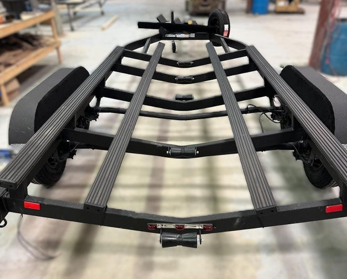 2x4 bunks mounted on trailer wrapped in Gatorbak smoke color