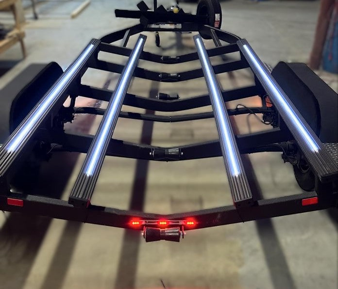 2x4 bunks mounted on trailer wrapped in Gatorbak smoke color with white LED Lights