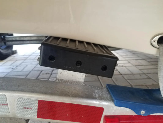 Gatorbak synthetic boat trailer bunk covers installed over structural bunk boards as an alternative to traditional carpet.