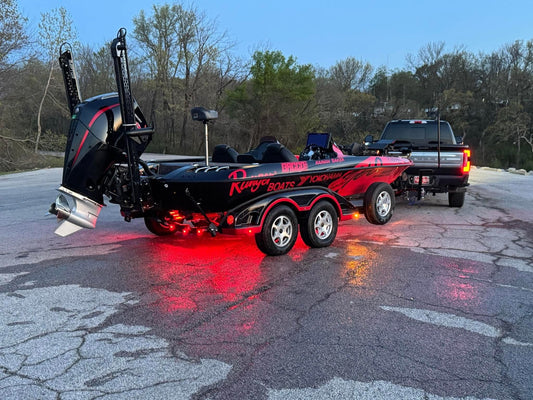Fishing boat on a trailer at a boat ramp illustrating common boat trailer mistakes and launch preparation tips